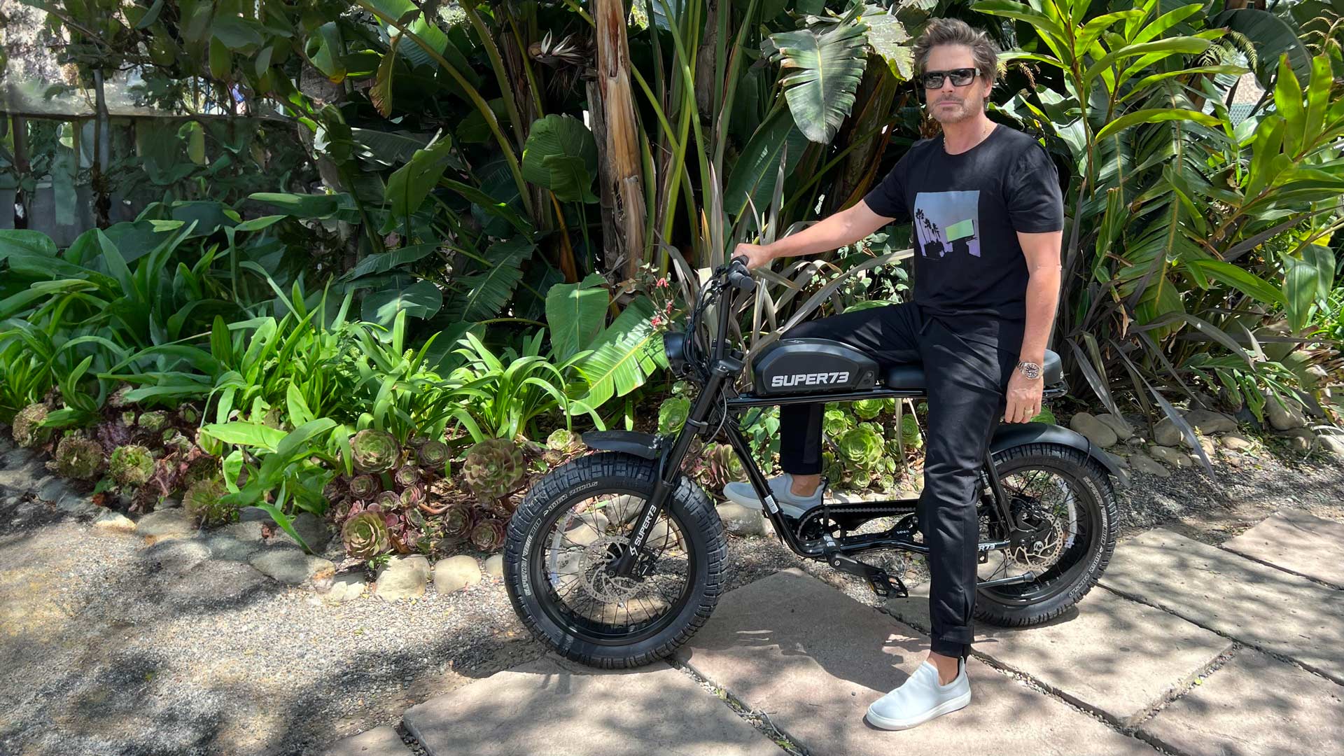 Image of actor Rob Lowe sitting on his SUPER73-S2 ebike.