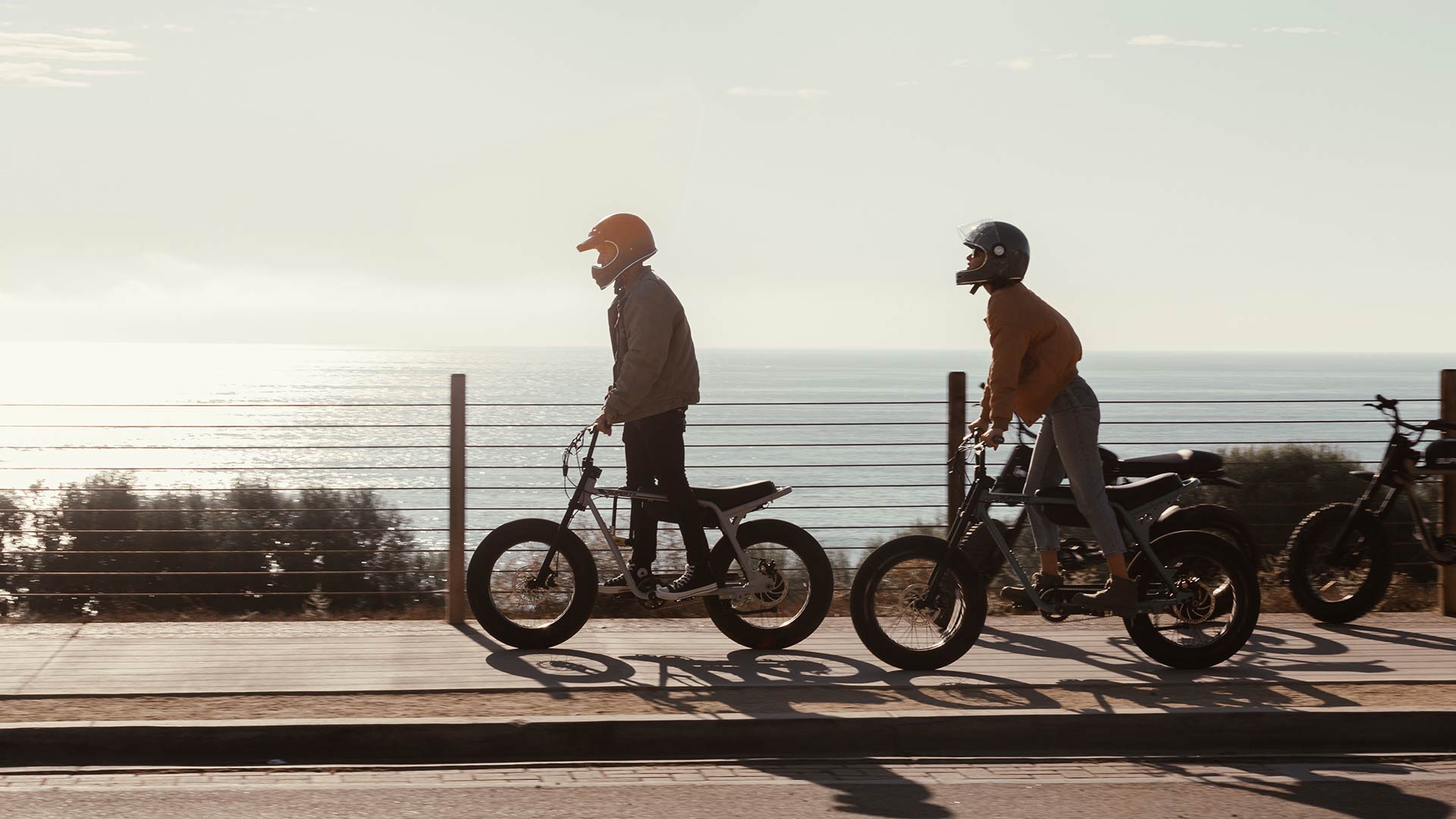 Two Super73 ebike riders out for a scenic ride overlooking the coast