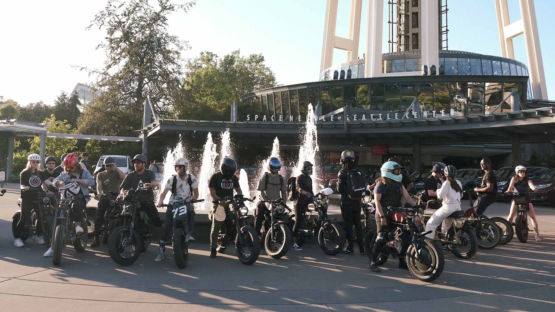 Super Squad group picture in front of the fountains at the Seattle Space Needle