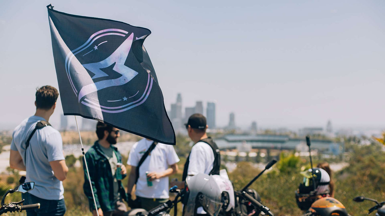 Super Squad flag waving in the wind during a rider meetup