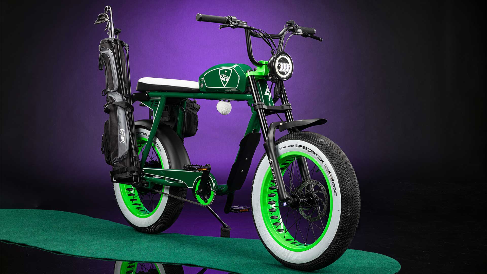 Topgolf collab bike in front of a purple backdrop