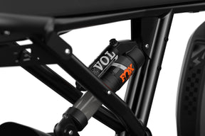 Detail shot of the Fox EVOL shocks on the SUPER73-R Blackout SE bike.