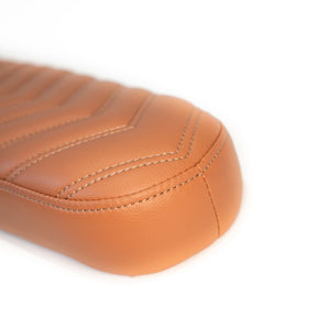 Front of the 2-up caramel chevron stitched  seat