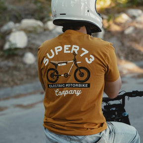 Back view of The Trailblazer Tee (Antique Gold) on male model riding his SUPER73