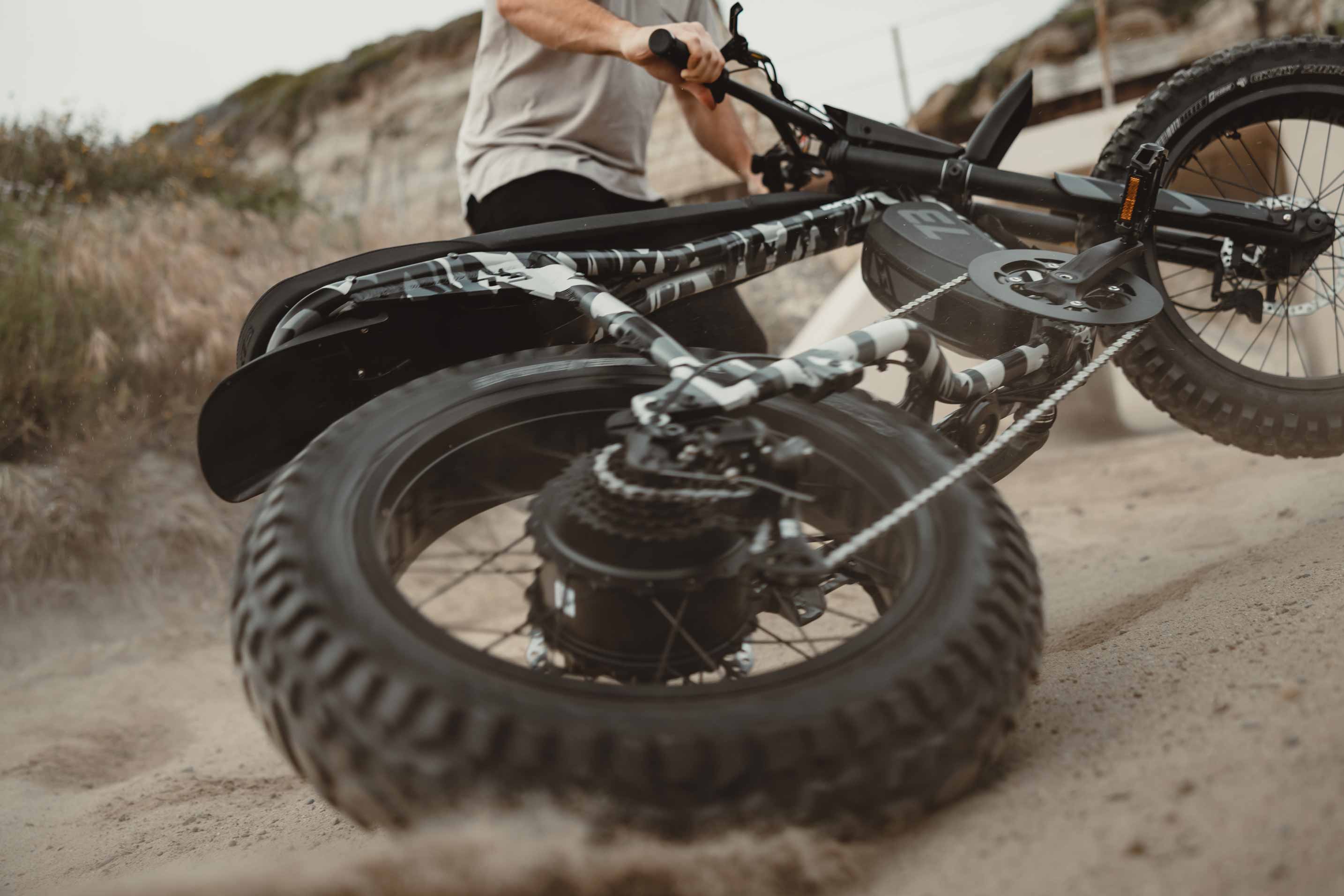The SUPER73 Adventure ebike in Snowshadow taking hard turns in the dirt