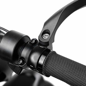 Close-up of the hardware and installation point of the BiKASE right-hand handlebar mirror