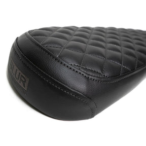 2-Up Black Diamond Stitch Seat by Blur Boundaries