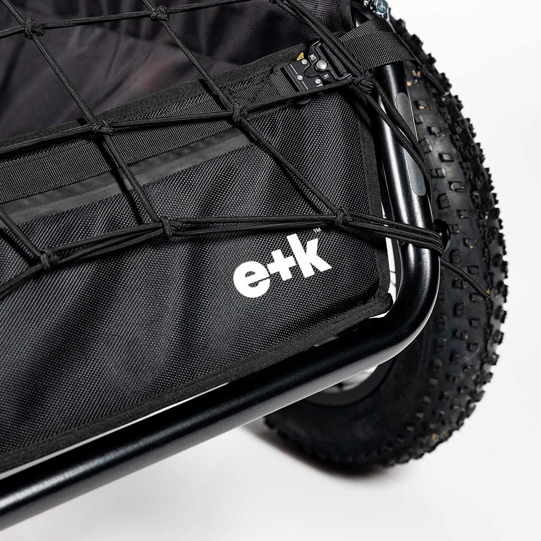 detail of logo on angle view of SUPER73 x Earth+Kin Ebike Trailer