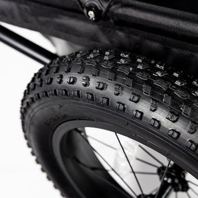 detail of tires on angle view of SUPER73 x Earth+Kin Ebike Trailer