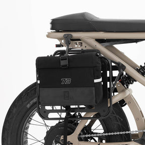 Side profile product image of the R Series Side Rack on bike with Chrome bag attached.