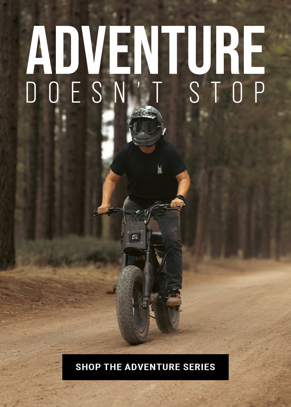 Lifestyle image of a man in a helmet riding a SUPER73-R Adventure Series ebike along a dirt path with trees lining the road.