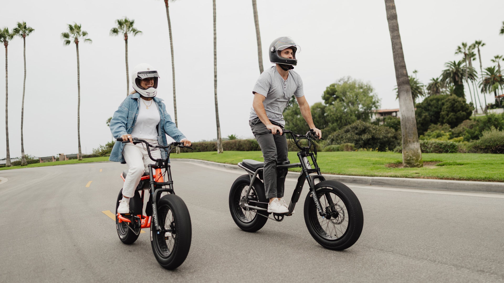 Two SUPER73 riders cruising along the street on the all-new Z Miami SE ebikes.