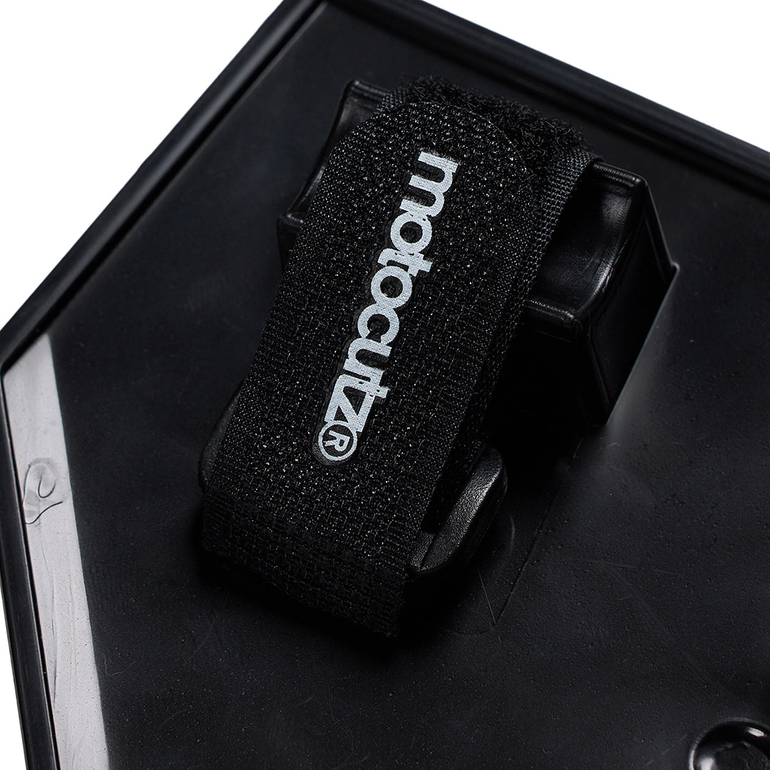 Close up view of the back side of the MotoCutz Micro Race Plate in Black