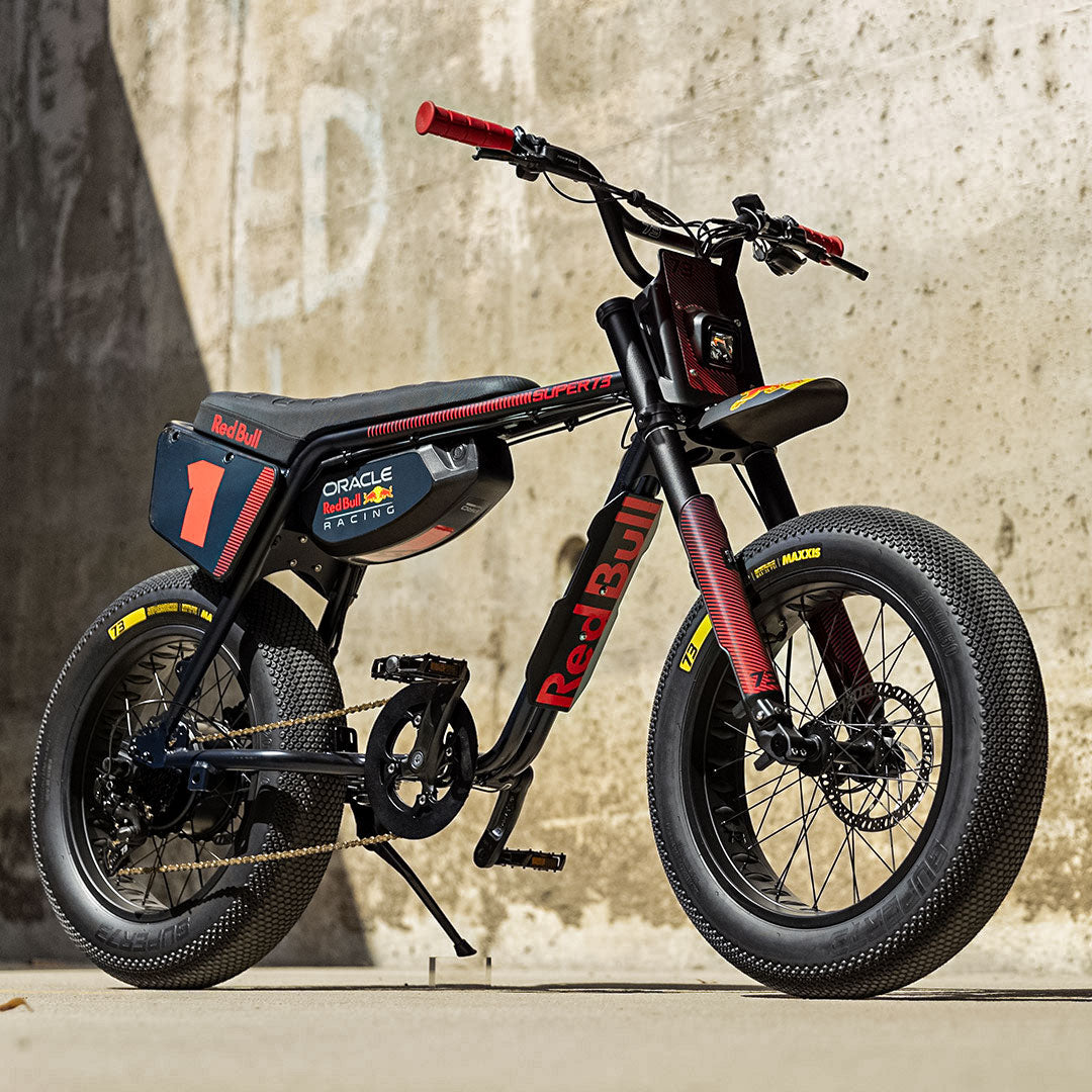 Lifestyle photo showing the side profile of the Oracle Red Bull Racing x SUPER73 Z Adventure Series ebike