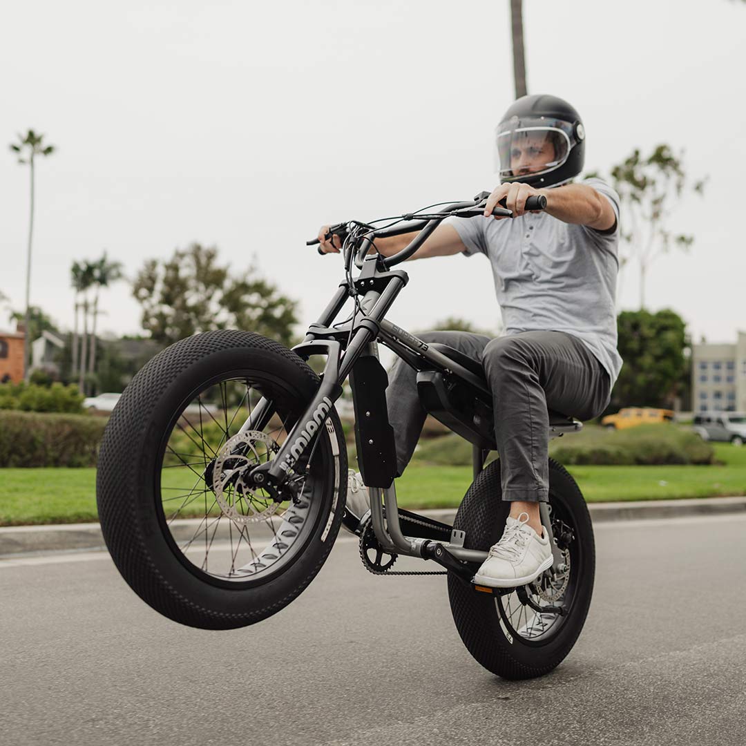 A man riding an Obsidian SUPER73-Z Miami SE bike.