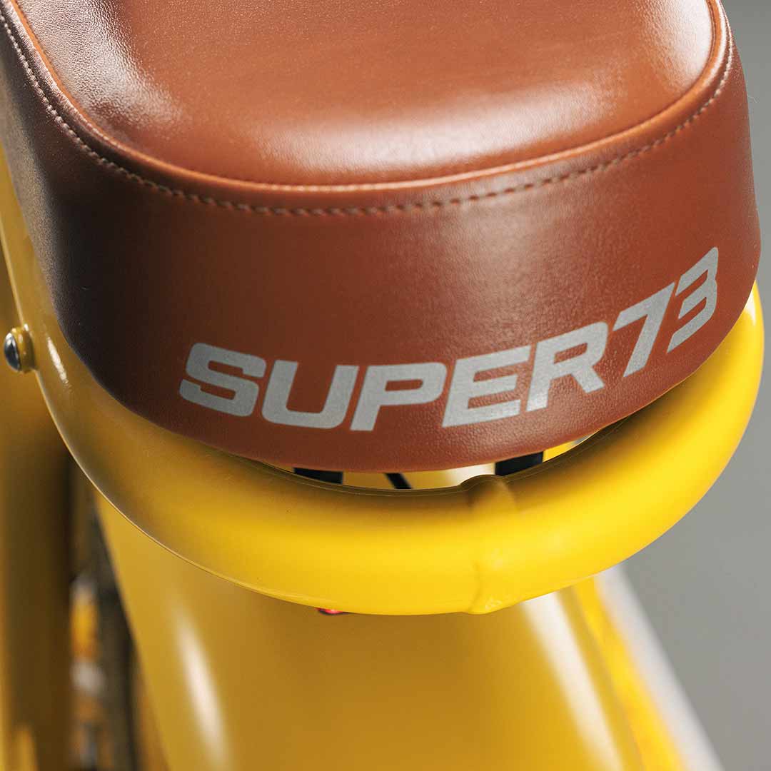 Close-up photo of the custom Pacifico x SUPER73-S2 bike seat.