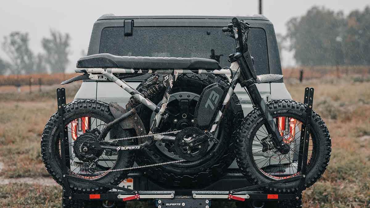 A SUPER73 R Series ebike on a bike rack of an SUV