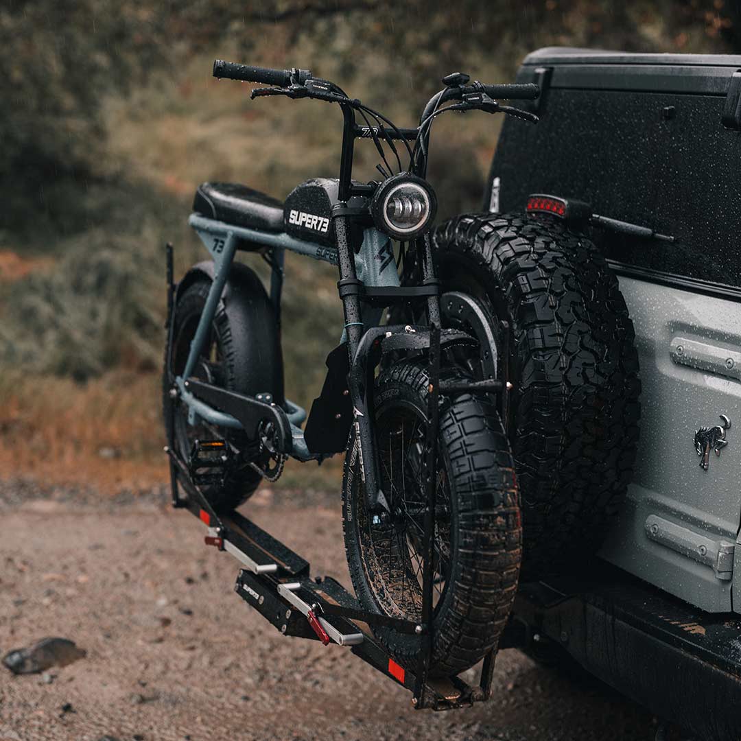 A SUPER73 S2 ebike on the back of a Bronco on a 1Up rack