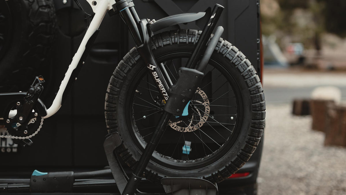 SUPER73 S2 ebike close up on it's BDGR tires on a rack on the back of a sprinter van