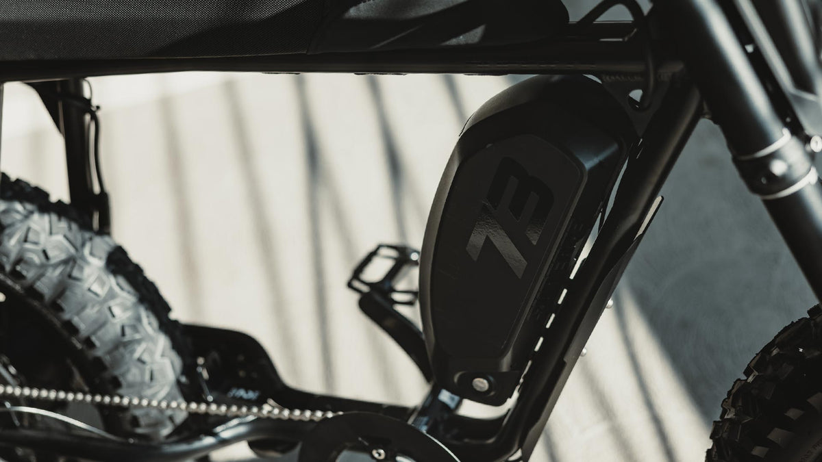 Close-up image of the removable battery on the SUPER73-S Blackout SE bike.