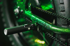 Closeup image of the SECTOR73 ZX First Contact bike Chain and folding pegs.