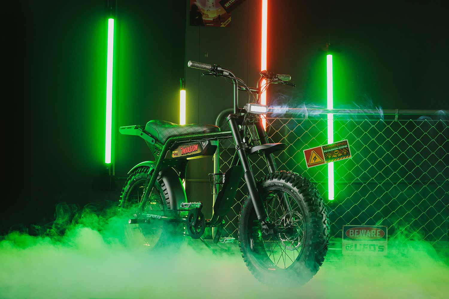 The SUPER73-ZX First Contact exclusive ebike on a green background