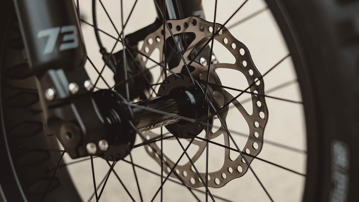 Closeup image of a Super73 Z Adventure ebikeshowing the hydraulic brakes