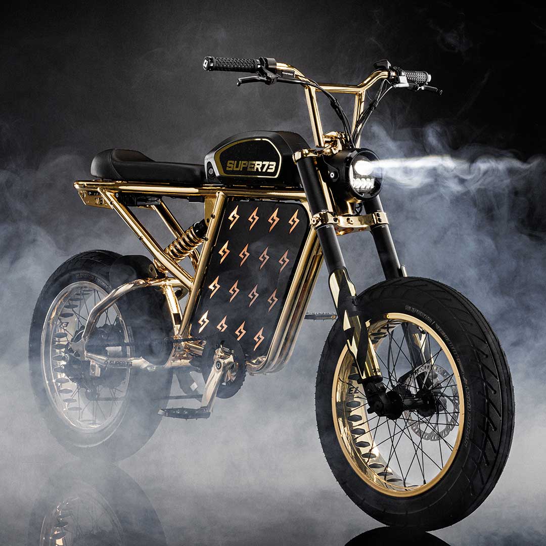 Custom R Brooklyn painted 24 carat gold frame, wheels, shock coil made for a YouTube and Video Marketing Conference in Los Angeles.