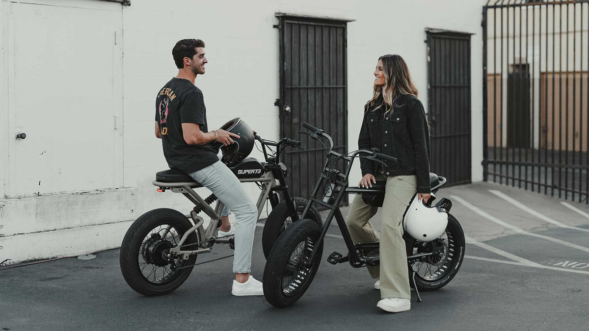 Riders chatting in alley sitting on Super73 ebikes