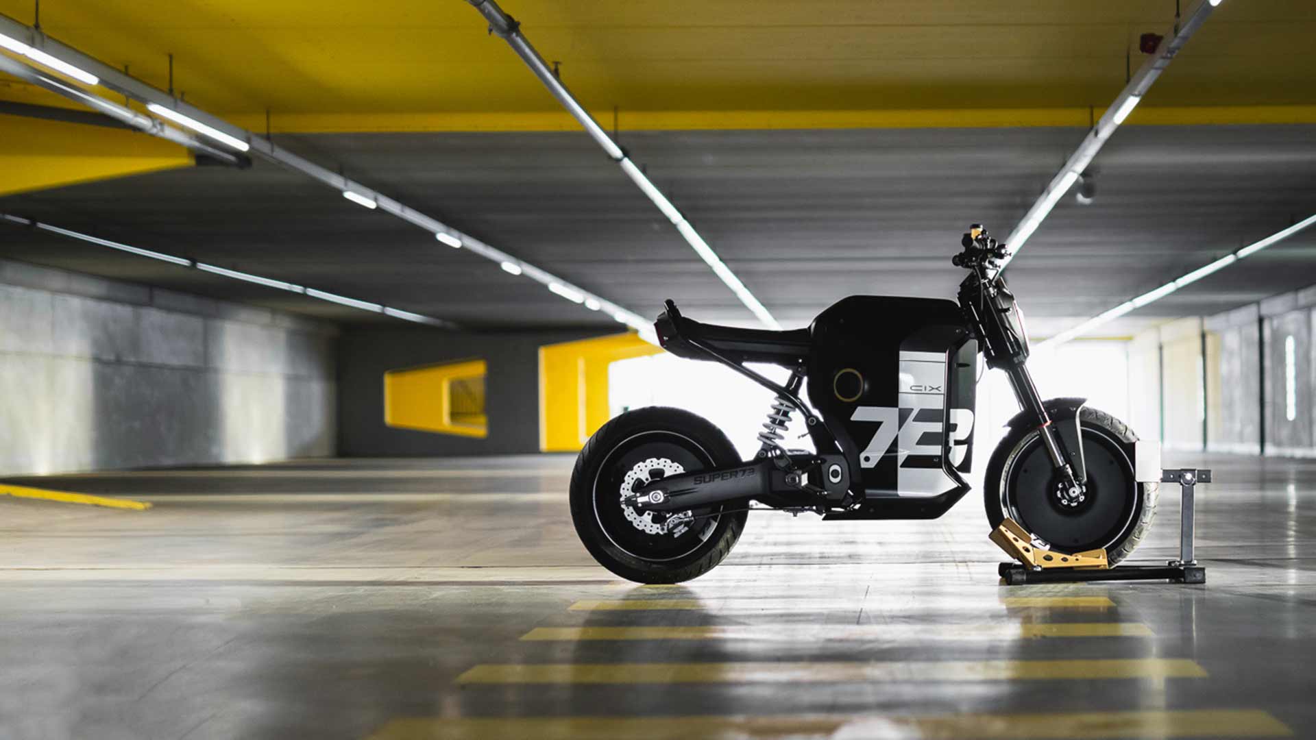 Lifestyle image of a C1X in a parking garage.