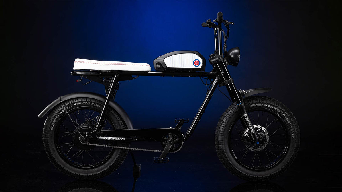 Super73 Chicago Cubs halo custom ebike in dark blue backdrop studio shot