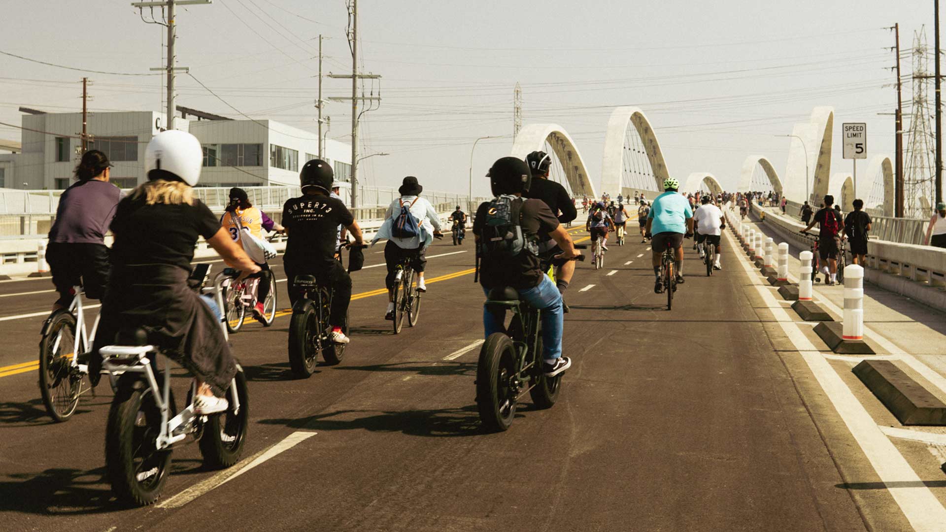 Group of Super73 ebike riders as part of the Super Squad riding as a group down the highway