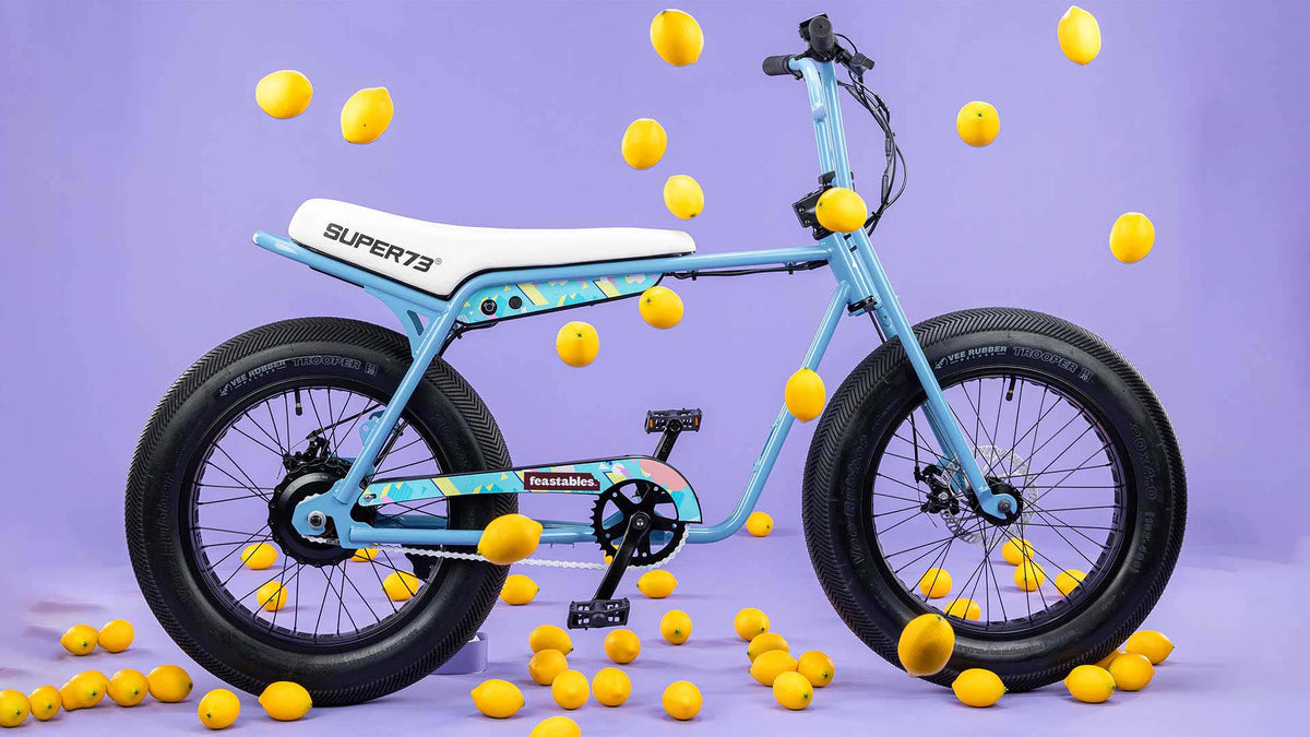 HALO custom Mr Beast Feastables bike with raining lemons and a purple background