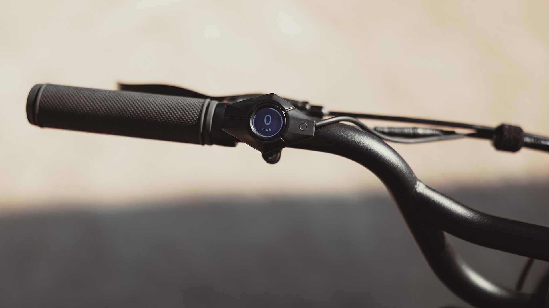 Closeup of the Super73 Z Miami ebike handlebar showing the smart display