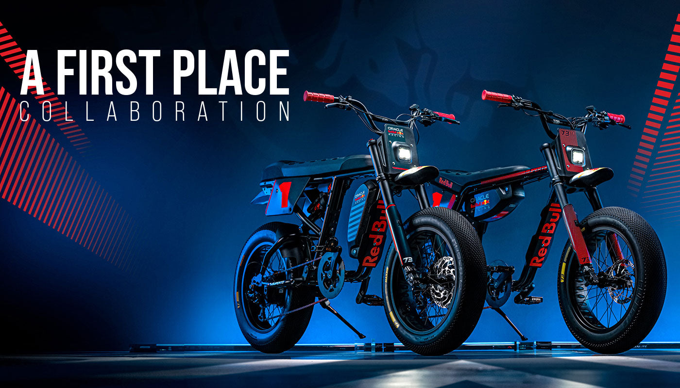 Stylized studio photo of the Oracle Red Bull Racing x SUPER73 R Adventure Series and Z Adventure Series ebikes.