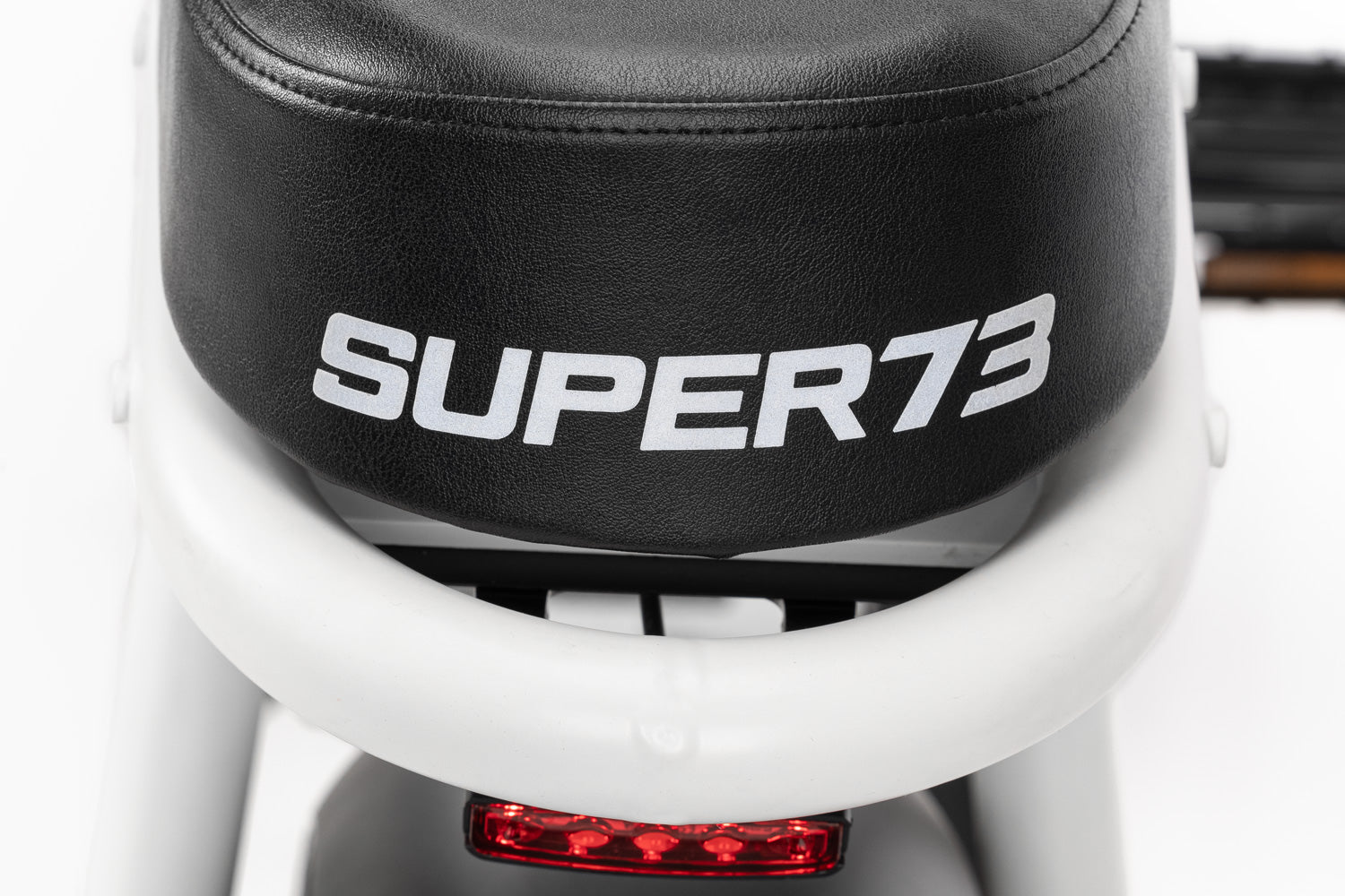 Closeup of the Super73-S2 in Bone White seat.