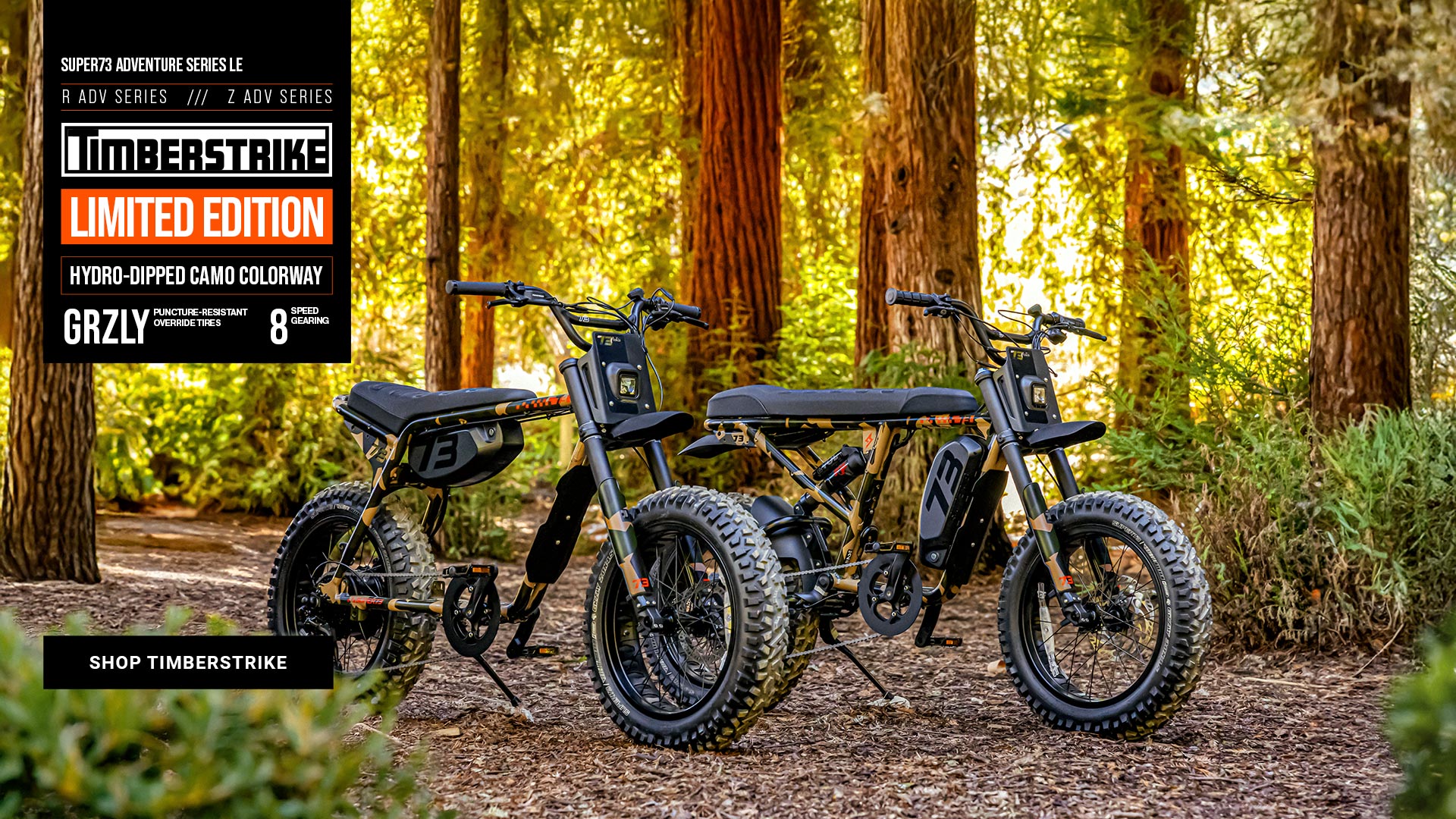 SUPER73-Z Adventure Series LE and SUPER73-R Adventure Series LE ebikes in Timberstrike photographed in a wooded area.