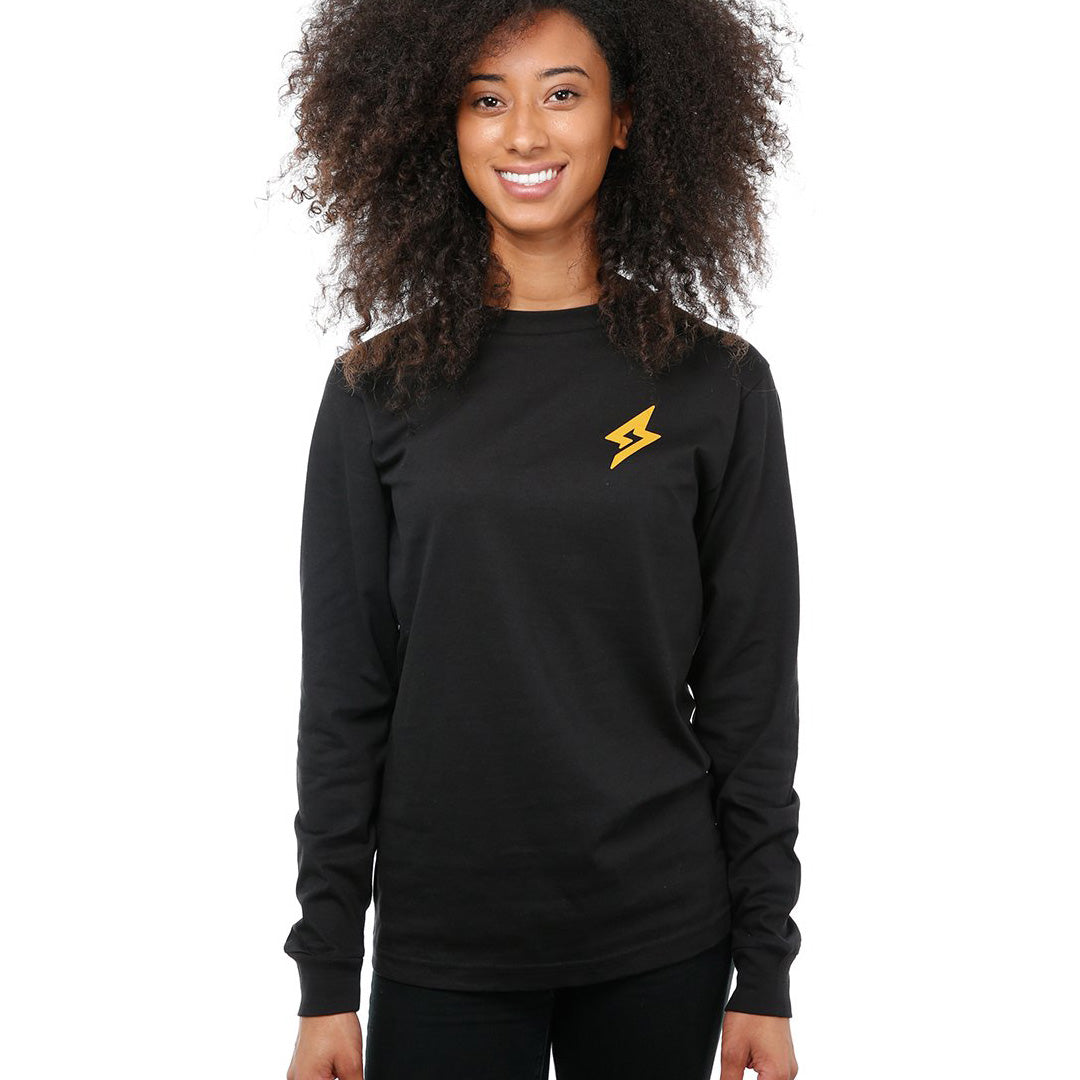 Front view of female model in Black Adventure Long Sleeve T-Shirt on white background.